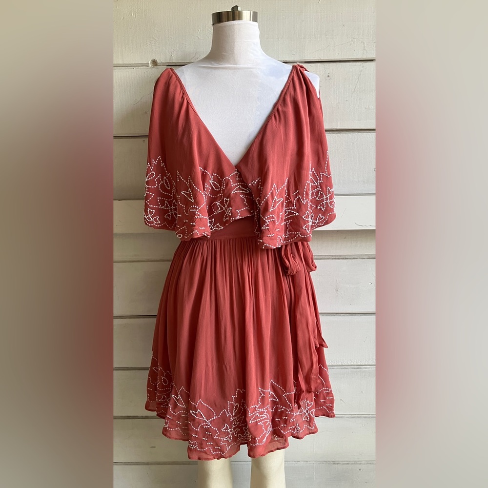 Free People dusty rose medium wrap dress. Never worn.
